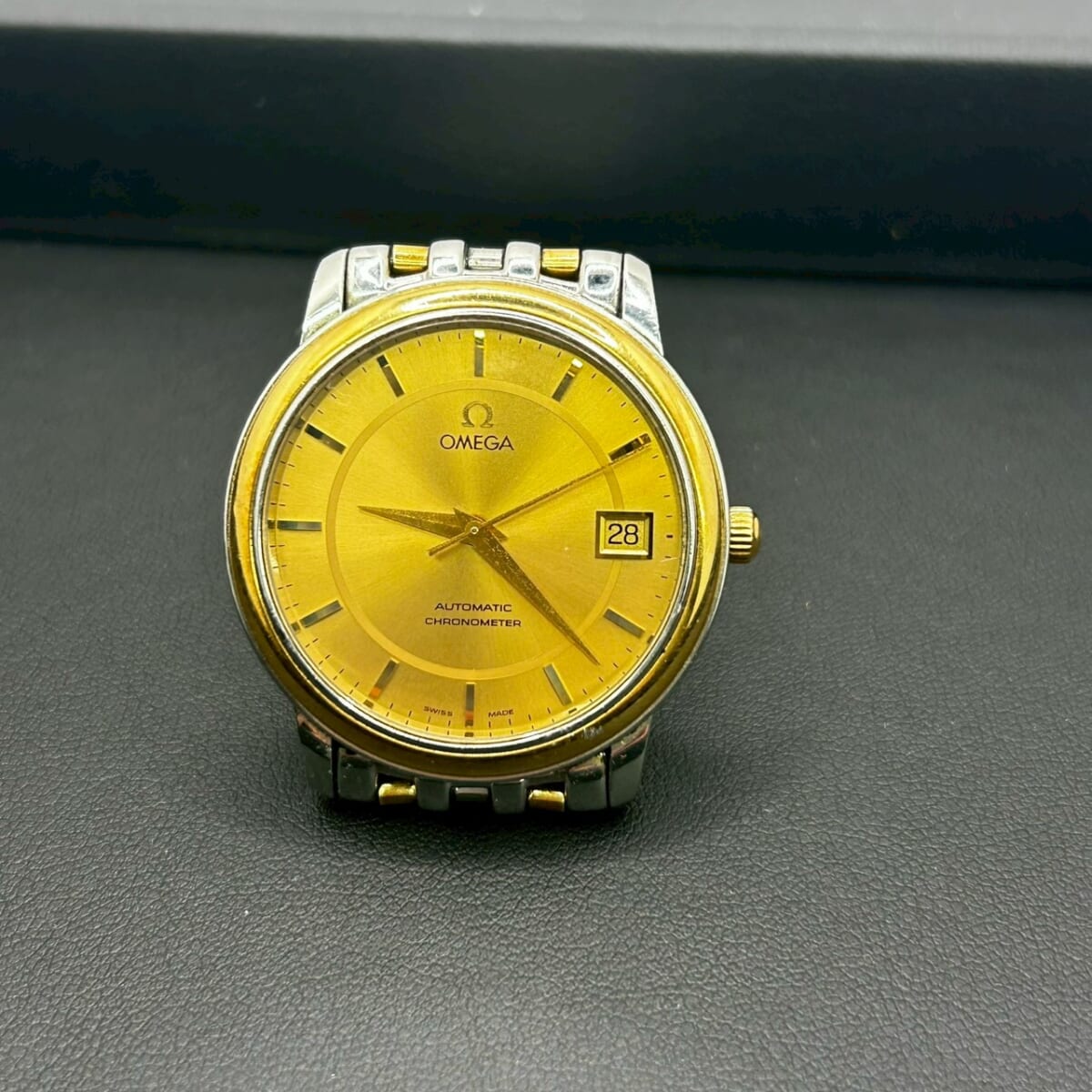 OMEGA メンズ腕時計 自動巻き ゴールド文字盤の買取